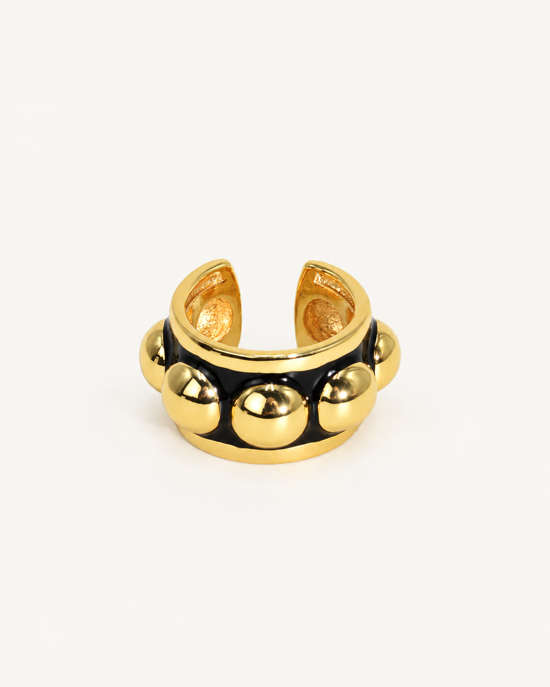 Anello Gold ÀLMALA nero e oro, vista frontale con dettagli in rilievo