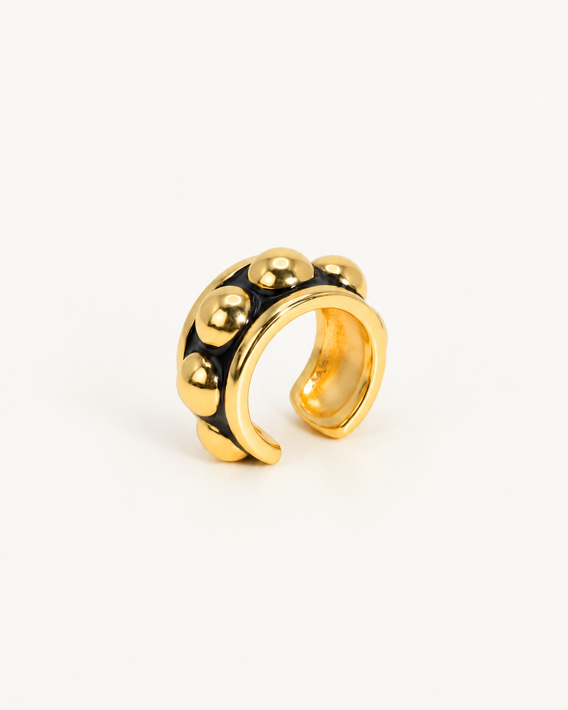 Anello Gold ÀLMALA nero e oro, vista di profilo
