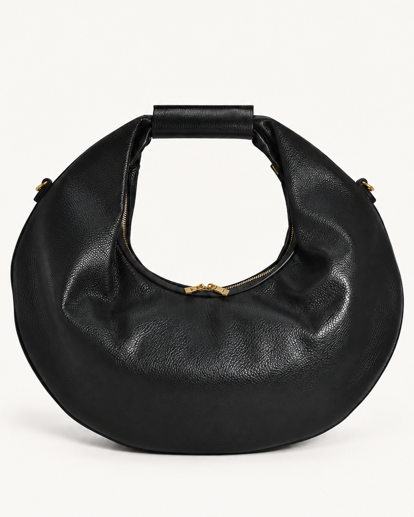 Borsa O’RING ÀLMALA nera, vista frontale con manico ad anello e dettagli color oro