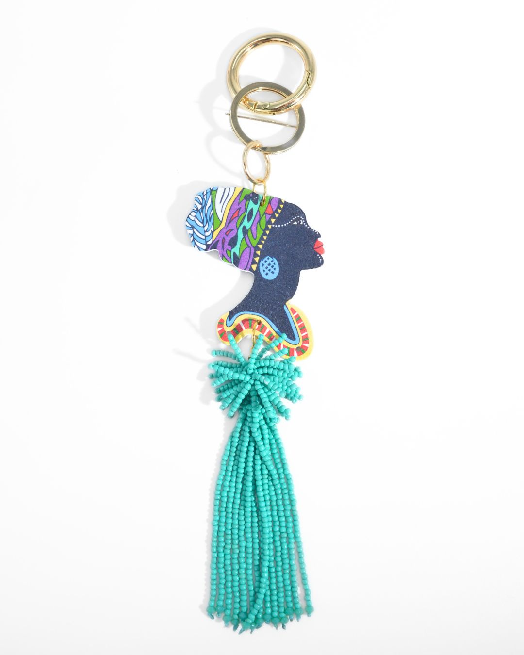 Charm da borsa Africa turchese con profilo femminile e nappina di perline