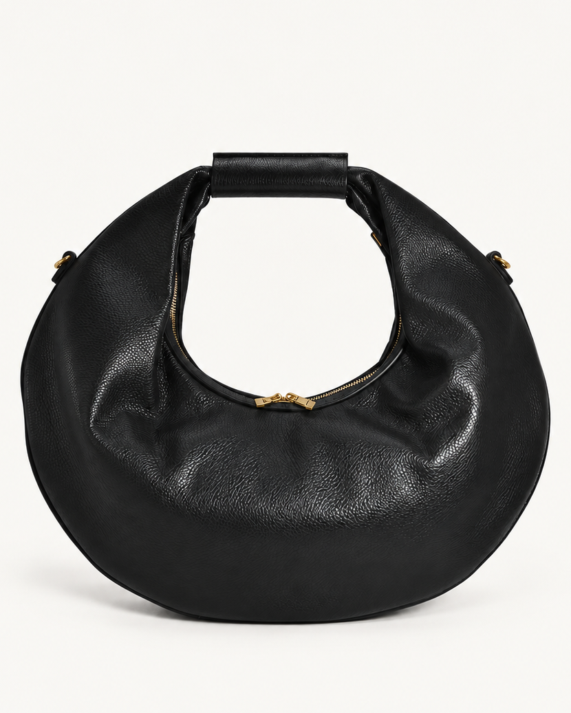 Borsa O’RING ÀLMALA nera, vista frontale con manico ad anello e dettagli color oro